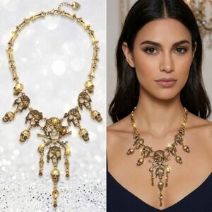 Gold plated pirate skull charm necklace With an adjustable chain